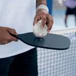 Wooden pickleball rackets with ball